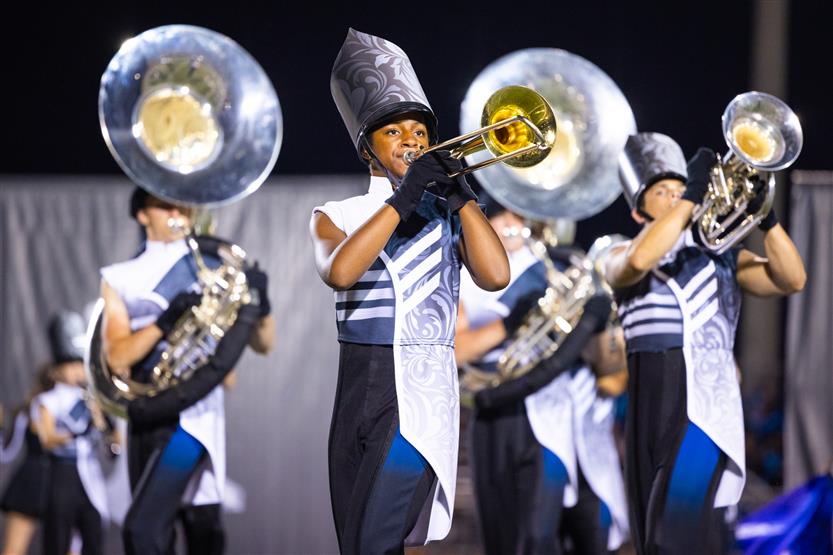 Students perform on football field